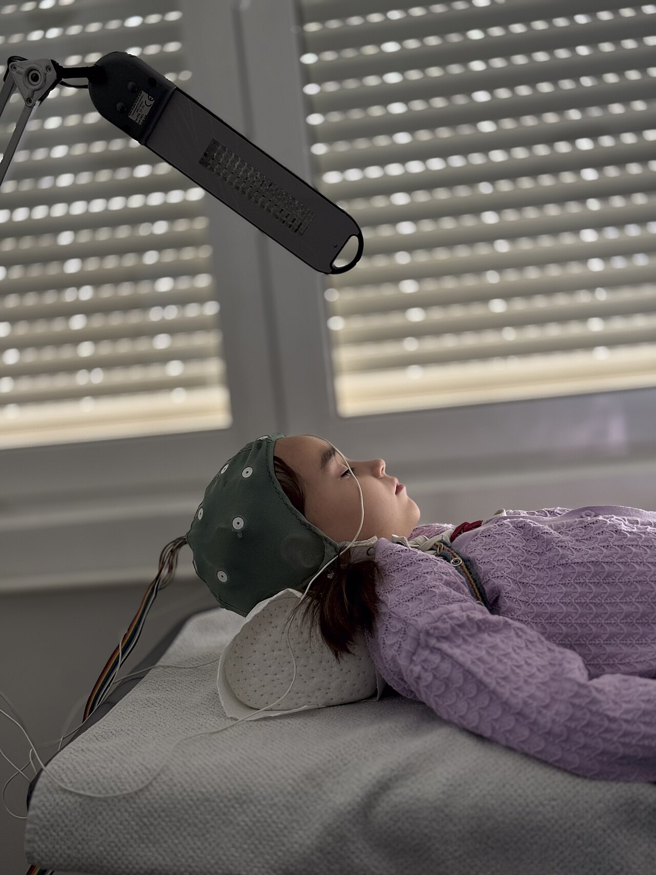 Continuous EEG monitoring at the bedside — the only way to confirm that electrical seizure activity has stopped once a paralysed or sedated patient can no longer convulse.