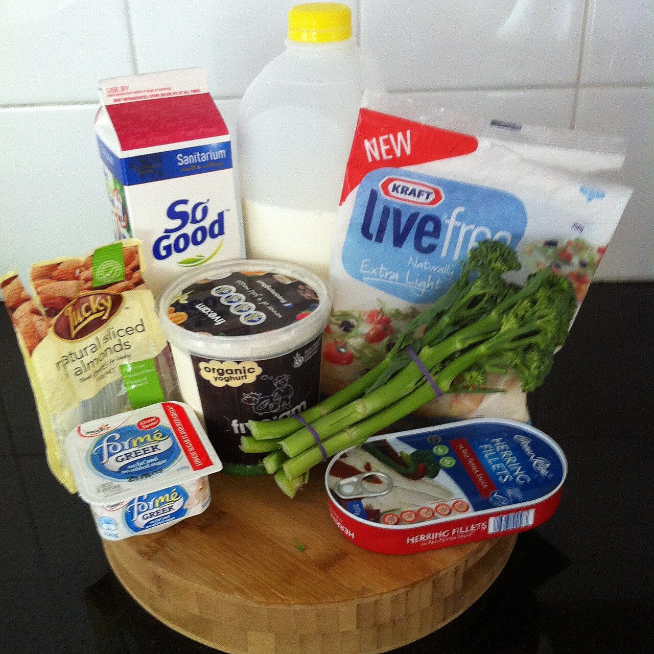 An assortment of calcium-rich foods including dairy products and leafy greens