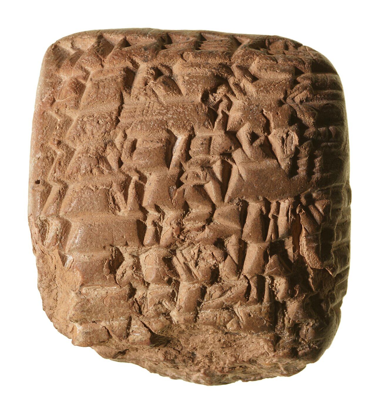 A small clay tablet covered in wedge-shaped cuneiform signs arranged in ruled boxes, an administrative record of grain rations from ancient Mesopotamia